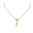 Faux Pearl Necklace With Rhinestone Bow Pendant CS Accessory Partners